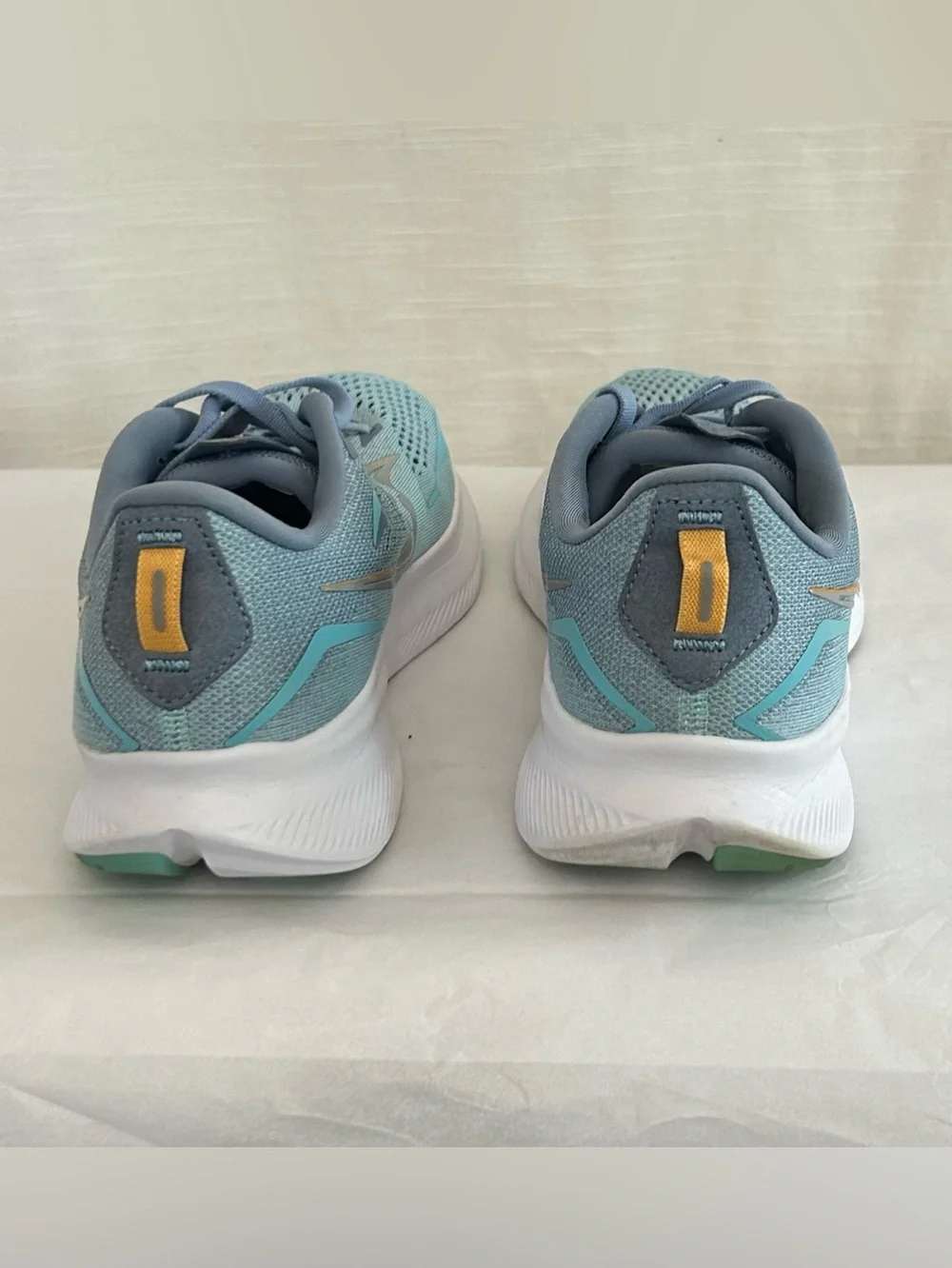 Saucony Ride 15 Women's Light Blue Athletic Sneakers with Yellow Accents